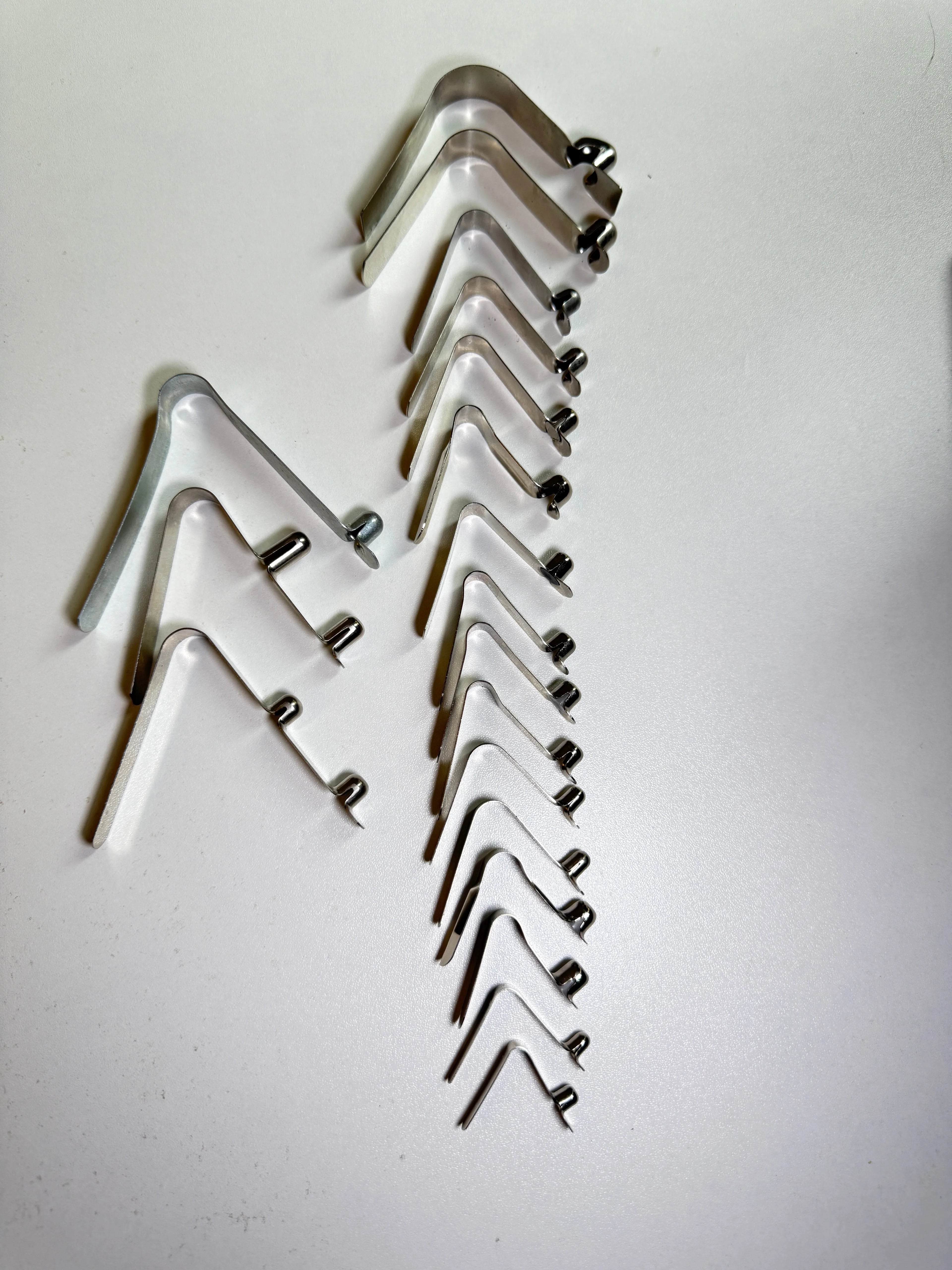 Custom Single-Head Spring Clip - full size range showcase, single and double button variants