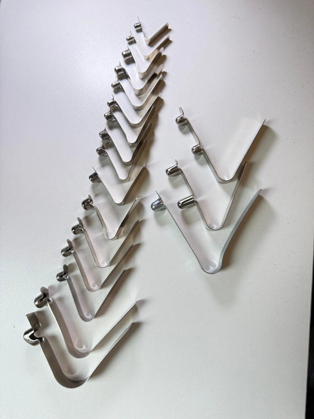 Custom Single-Head Spring Clip - size comparison lineup, all single-head styles