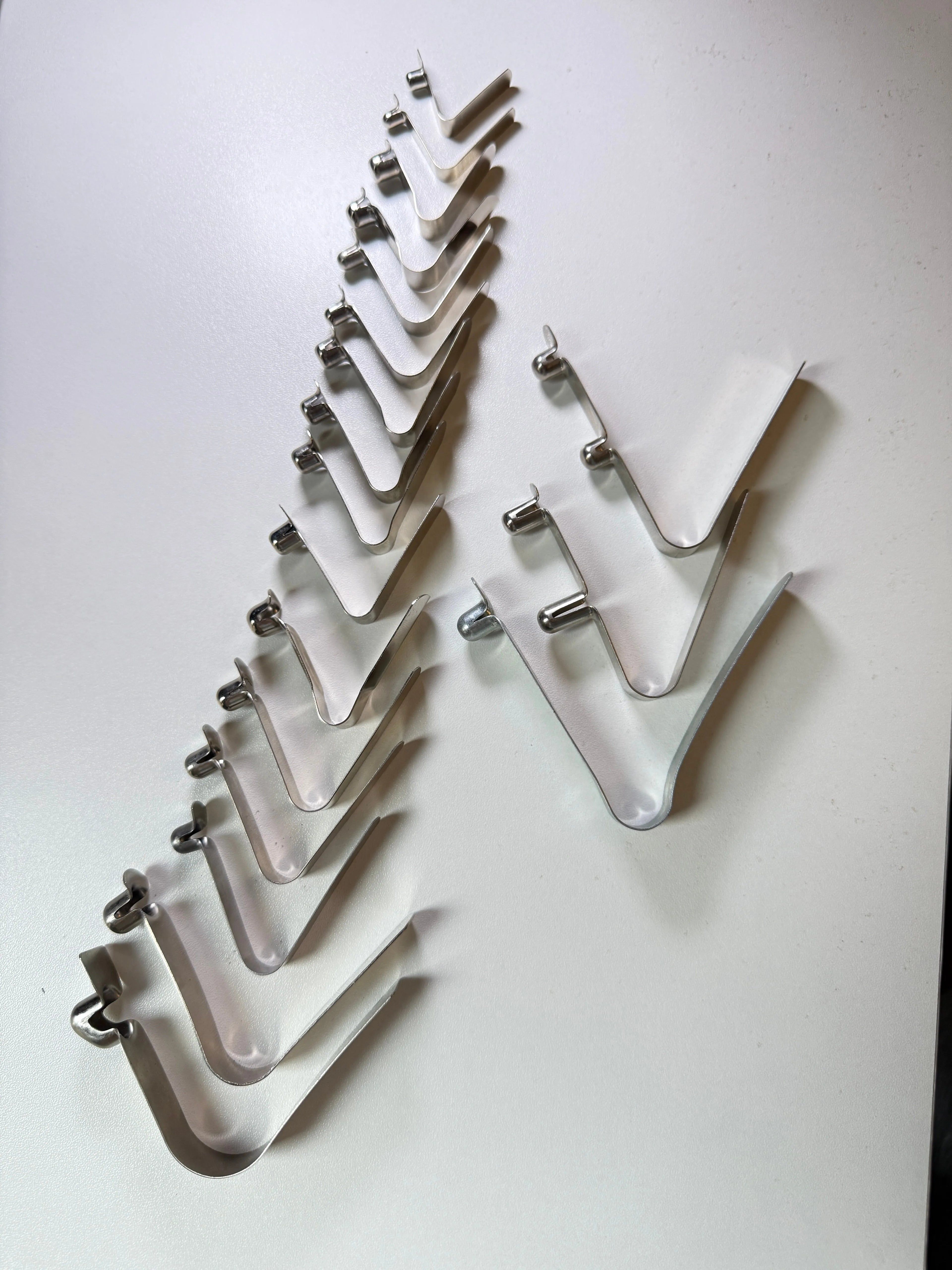 Custom Single-Head Spring Clip - size comparison lineup, all single-head styles